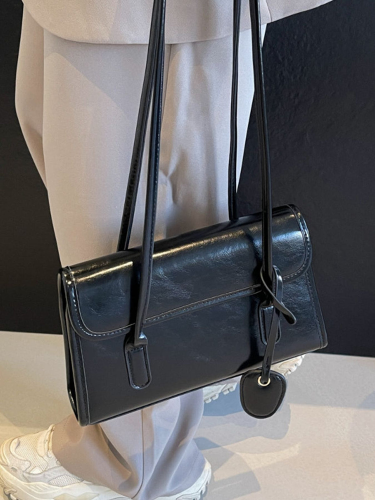 Small PU Leather Shoulder Bag in black with flap closure