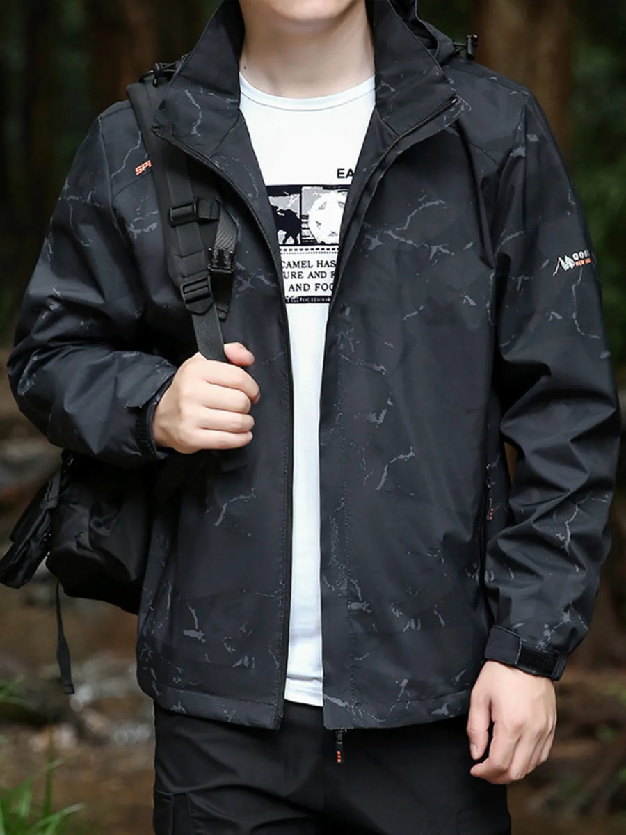 Black windbreaker jacket with a marble-like pattern, hooded, long sleeves, and adjustable cuffs.