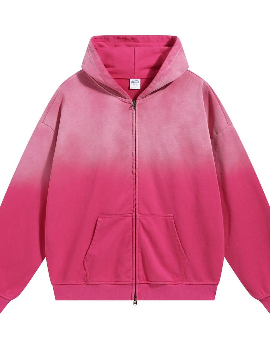 Oversized zip-up hoodie with vintage wash ombre pink and a front pocket.