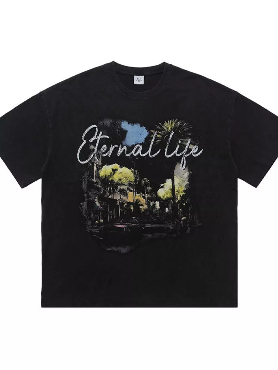 Black cotton graphic tee with "Eternal Life" text and vintage street scene graphic.