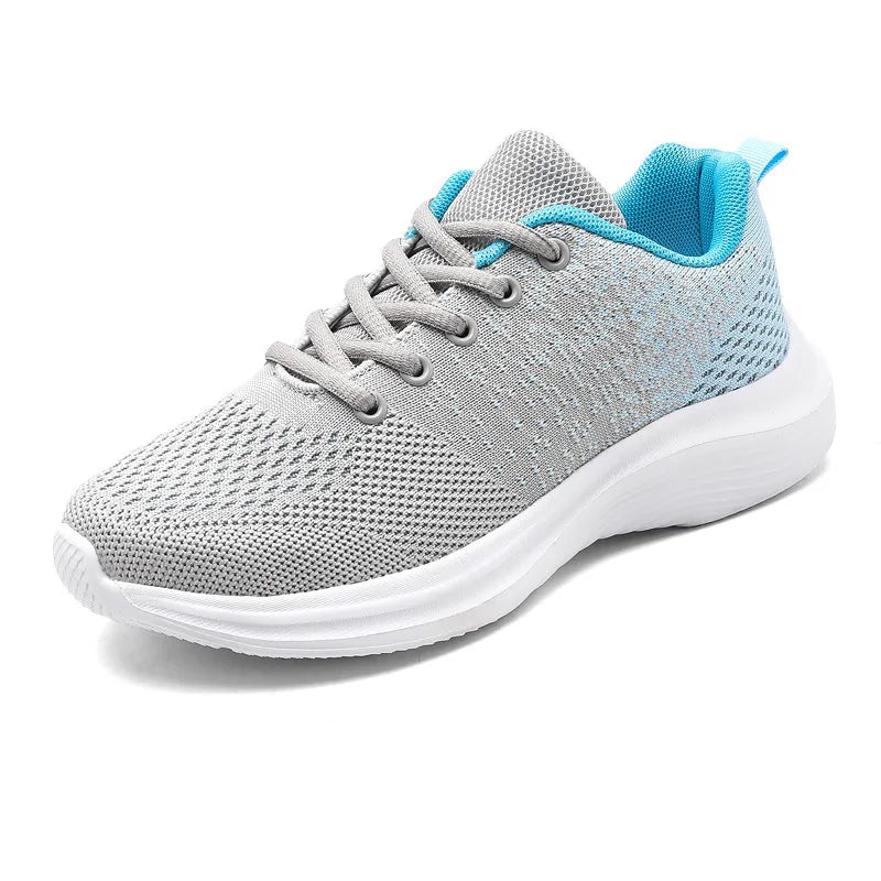 Light gray knit athletic shoes with blue accents and white soles.