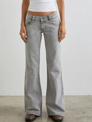 Light gray low rise flare leg jeans with pockets and button fly