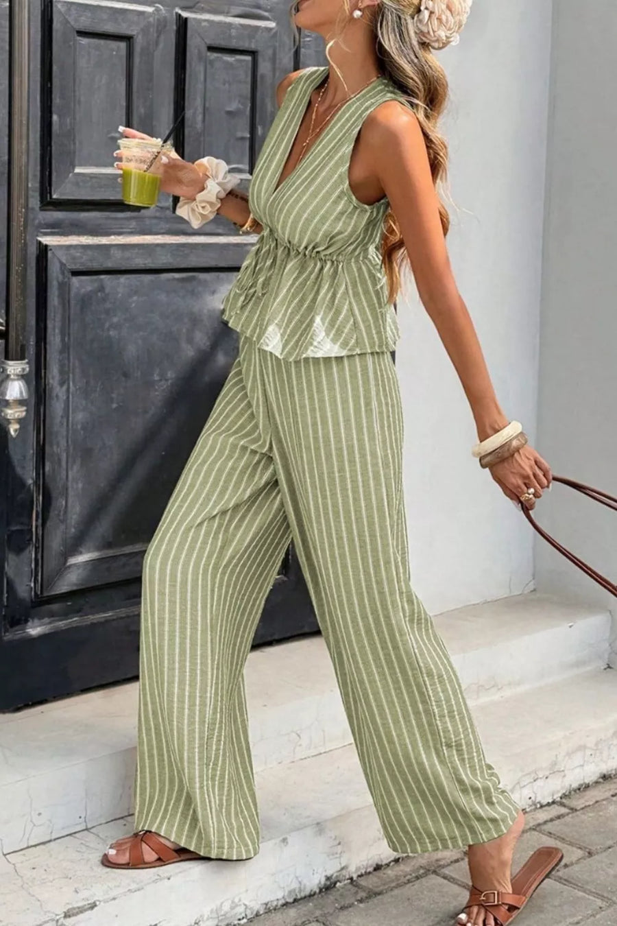 Sage striped two-piece set with peplum top and wide-leg pants