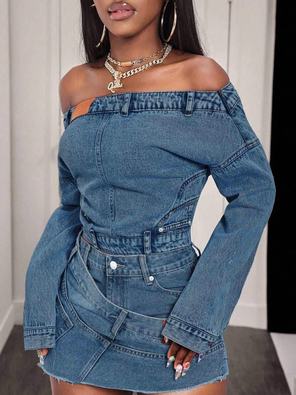 off-shoulder top in medium blue featuring buttoned and fitted fit