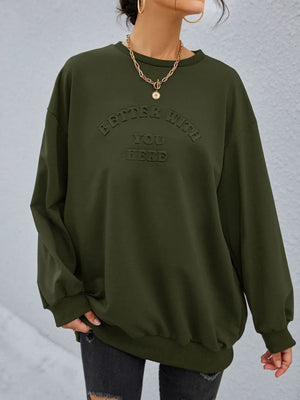Embossed sentiment oversized sweatshirt in Black Forest, crewneck, long sleeve, casual fit