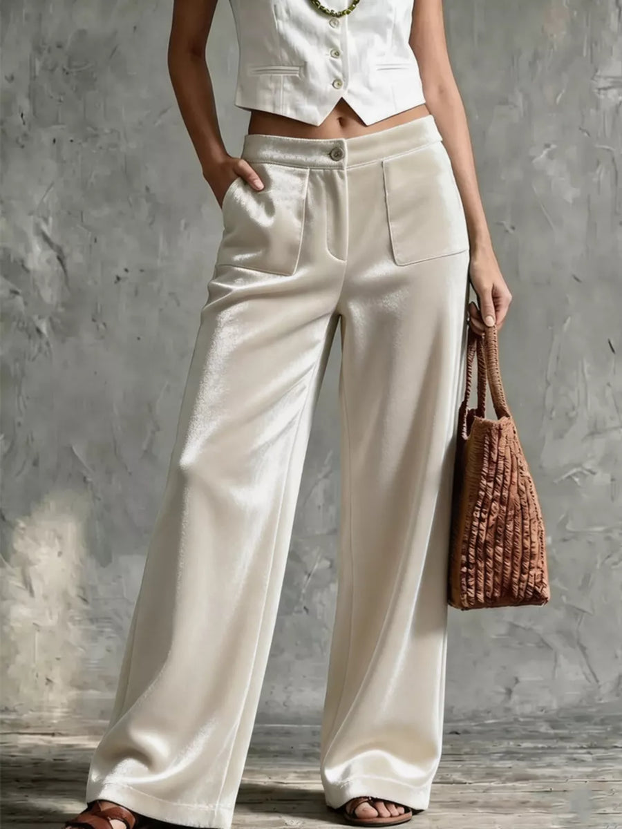 wide-leg pants in ivory featuring buttoned and flared fit