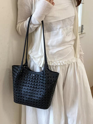 Red shoulder bag featuring woven and woven