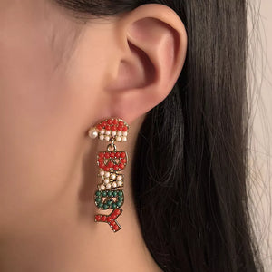 earrings in red featuring beaded and drop fit