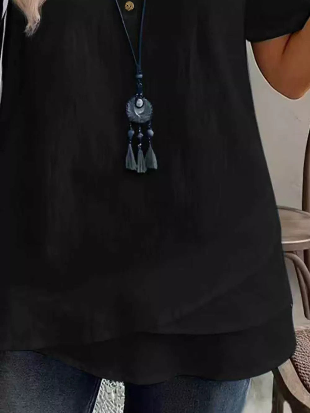 100% polyester Care instructions: Machine wash cold blouse in Black with relaxed silhouette