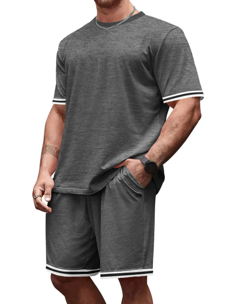 Men's grey t-shirt and shorts set with white striped trim on sleeves and shorts hem