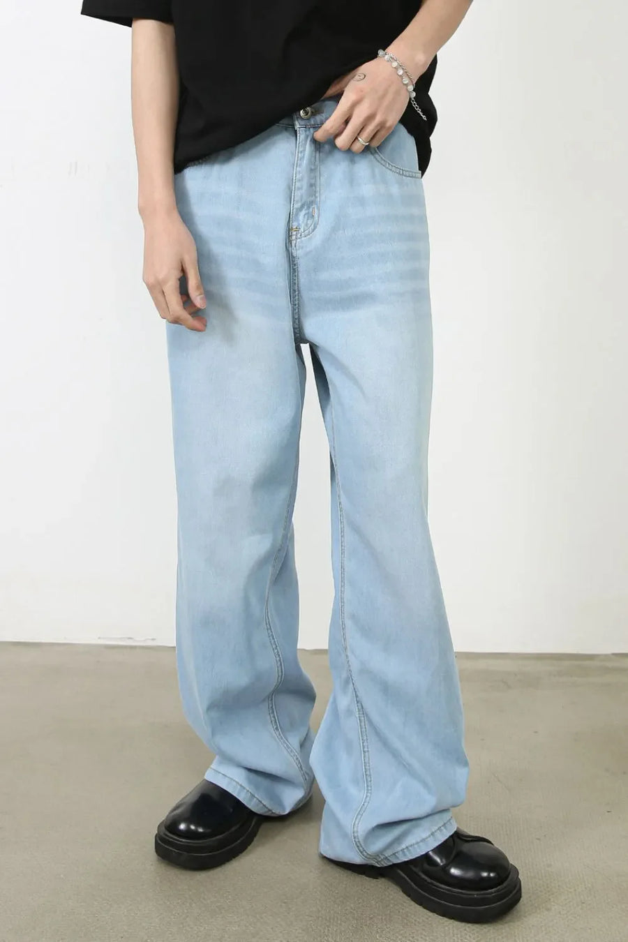 Light wash denim wide-leg jeans with a relaxed fit.
