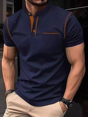 Navy polo shirt with contrast orange stitching, mandarin collar, and chest pocket.