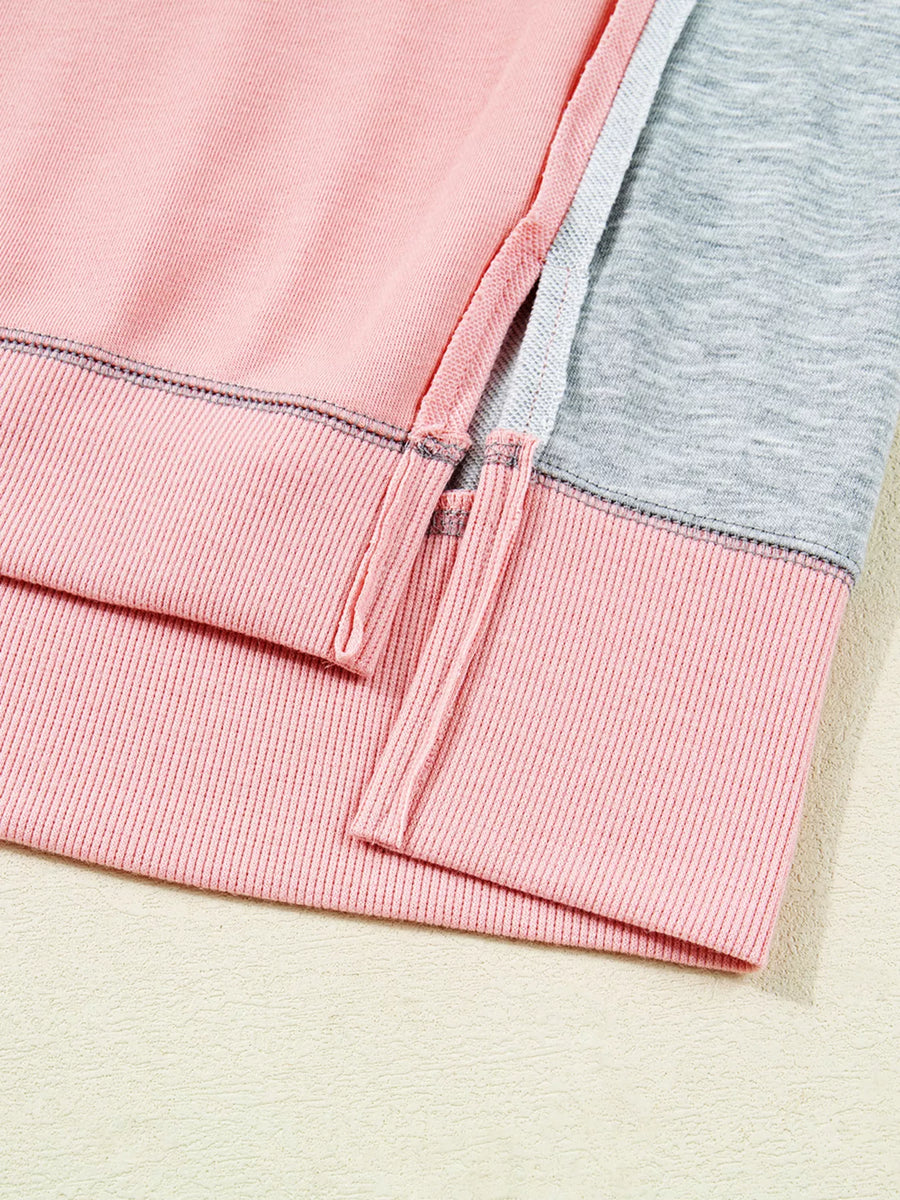 Oversized Dusty Pink sweatshirt with contrast stitching and side slits.