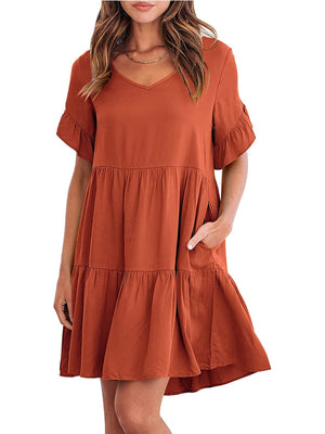 Caramel ruffled sleeve mini dress with pockets and tiered skirt.