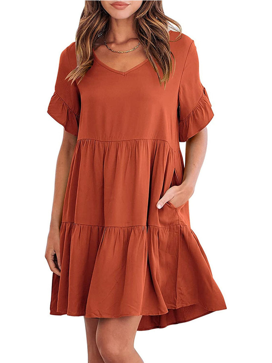 Caramel ruffled sleeve mini dress with pockets and tiered skirt.