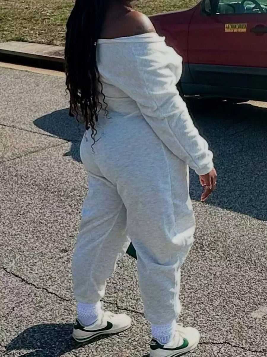 95%cotton, 5%spandex Care instructions: Machine wash cold jumpsuit in White with oversized silhouette
