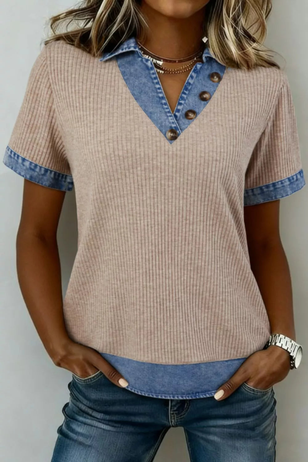Ribbed knit tunic top in beige with a denim collar and short sleeves, featuring button details.