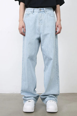 Baggy light blue denim palazzo jeans with a relaxed fit and button fly.