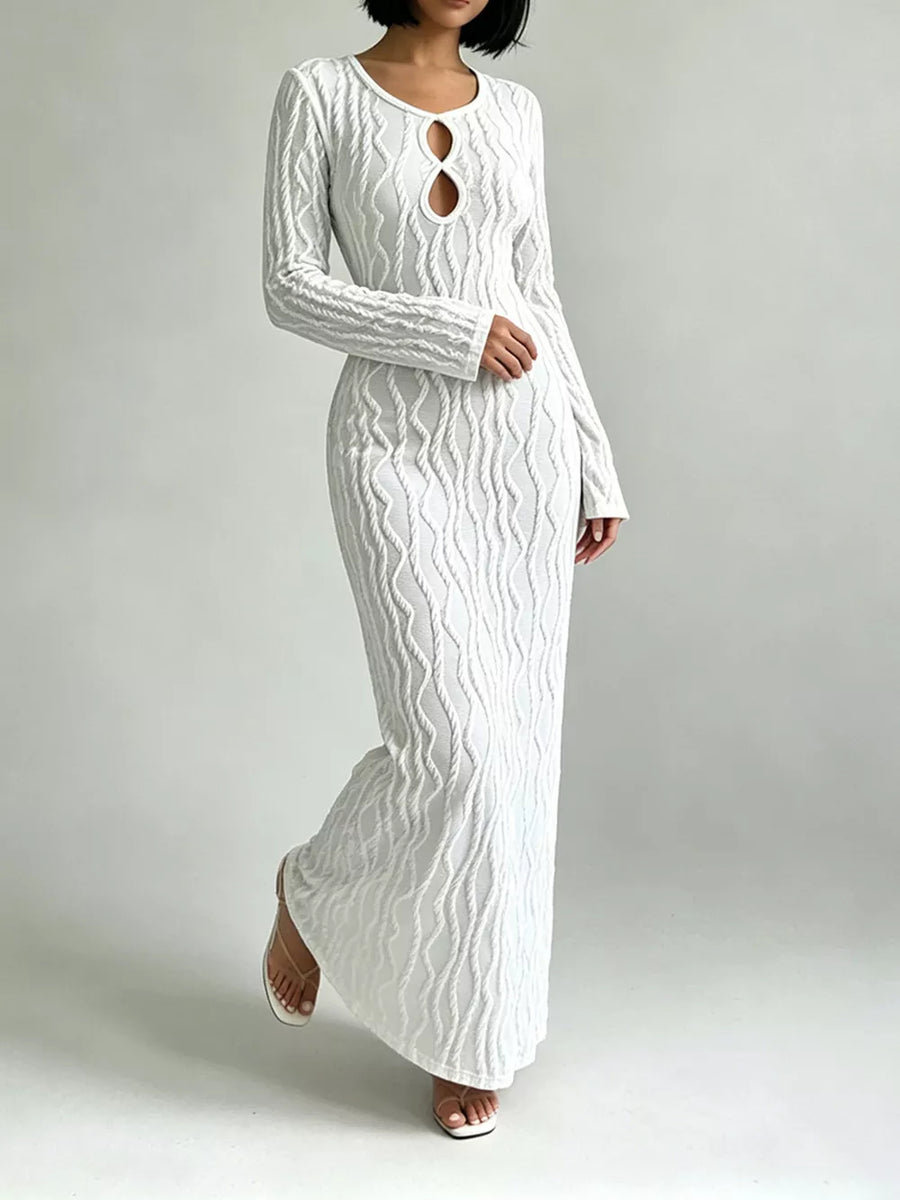 White textured long sleeve maxi dress with cutout neckline and rope-like pattern.