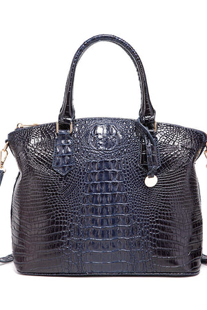 Dark Blue crocodile embossed satchel bag with top handles and shoulder strap.