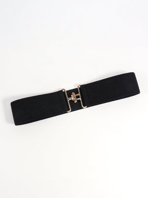 Black elastic belt with sculpted gold buckle