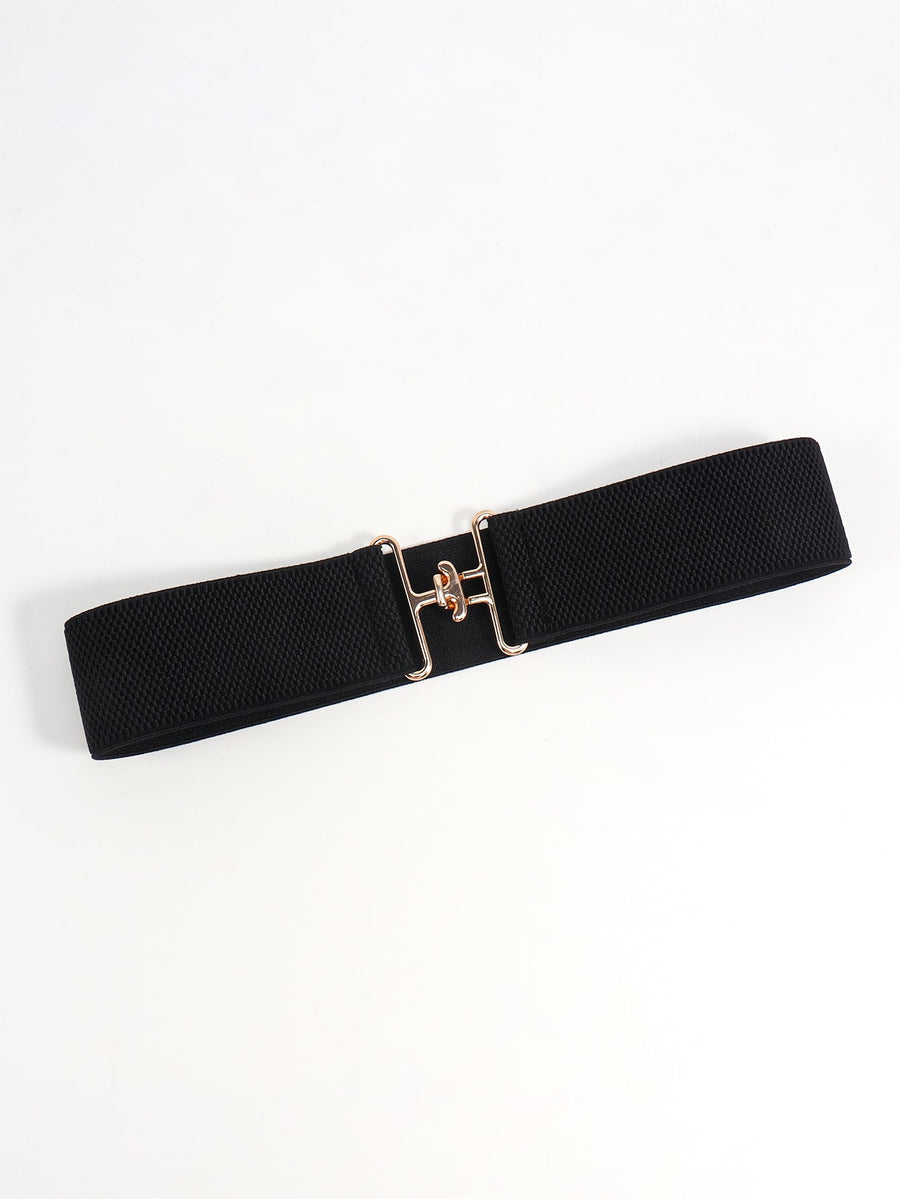 Black elastic belt with sculpted gold buckle