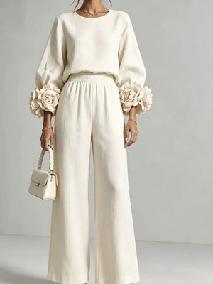 two-piece set in Blush Pink with pocketed and hip-length (top), full-length (pants)