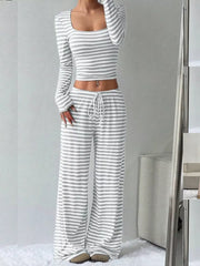 Light gray striped crop top and wide-leg pants with drawstring waist.
