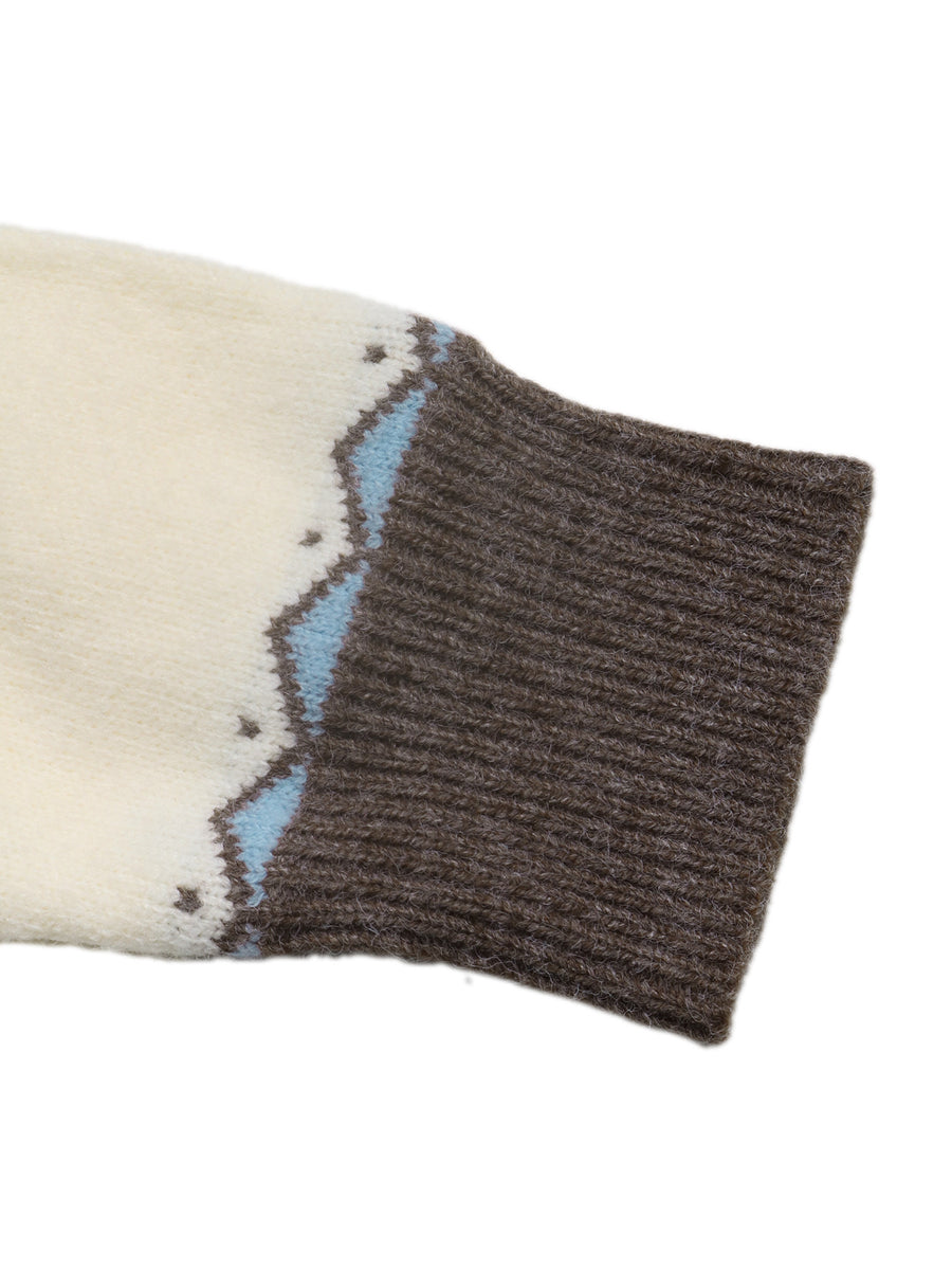 brown pullover sweater with ribbed cuffs and long sleeve
