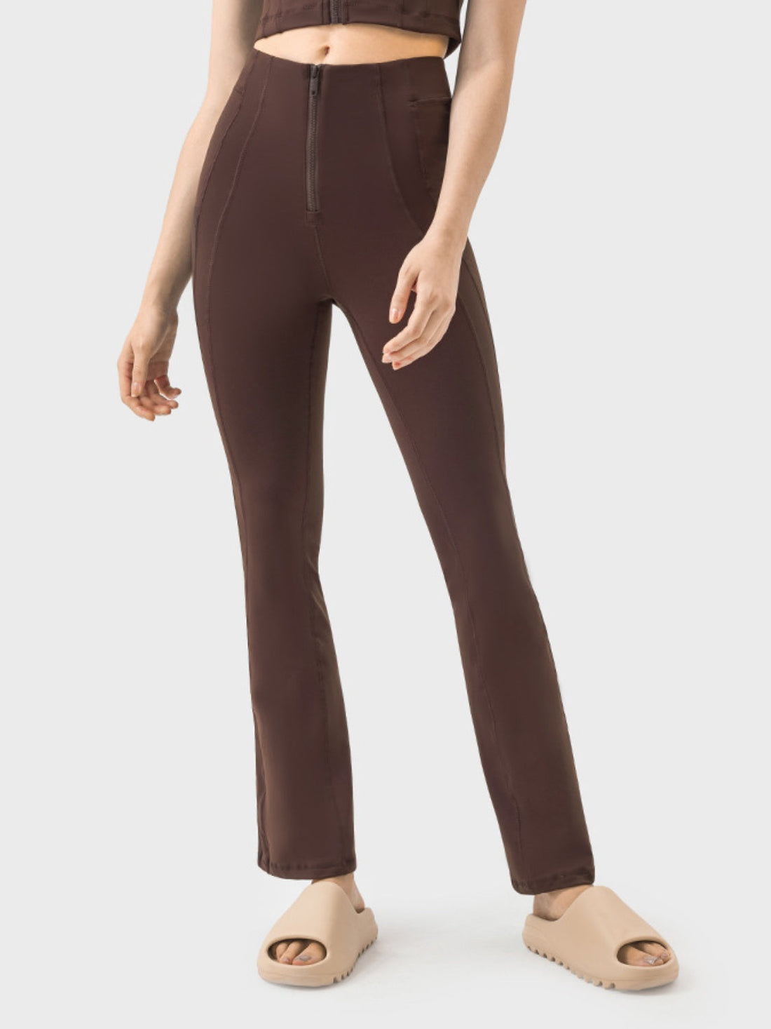 Sculpted flare active zip trousers in chocolate brown with a high waist and flared leg.