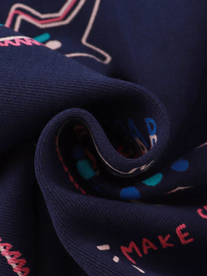 Dark navy cotton sweatshirt with dinosaur print and ruffled detail.