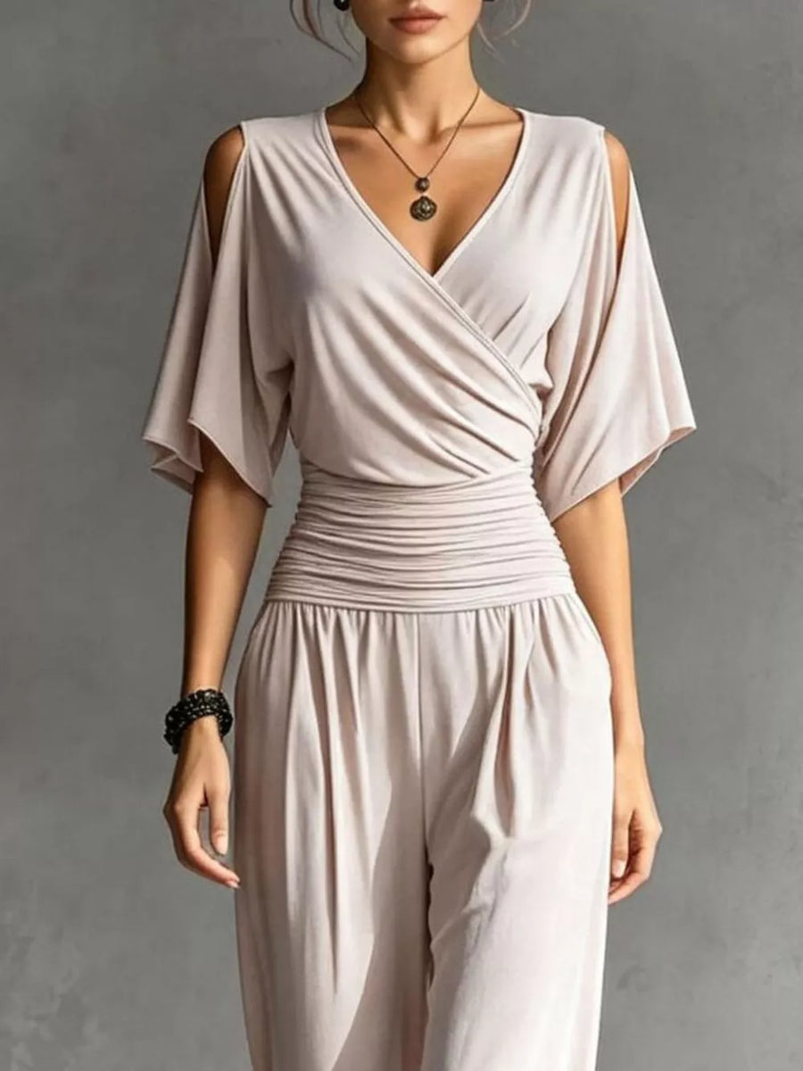 100% polyester Care instructions: Machine wash cold jumpsuit in beige with relaxed silhouette