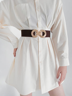 Interlocking circle stretch belt in dark brown with gold alloy buckle detail.