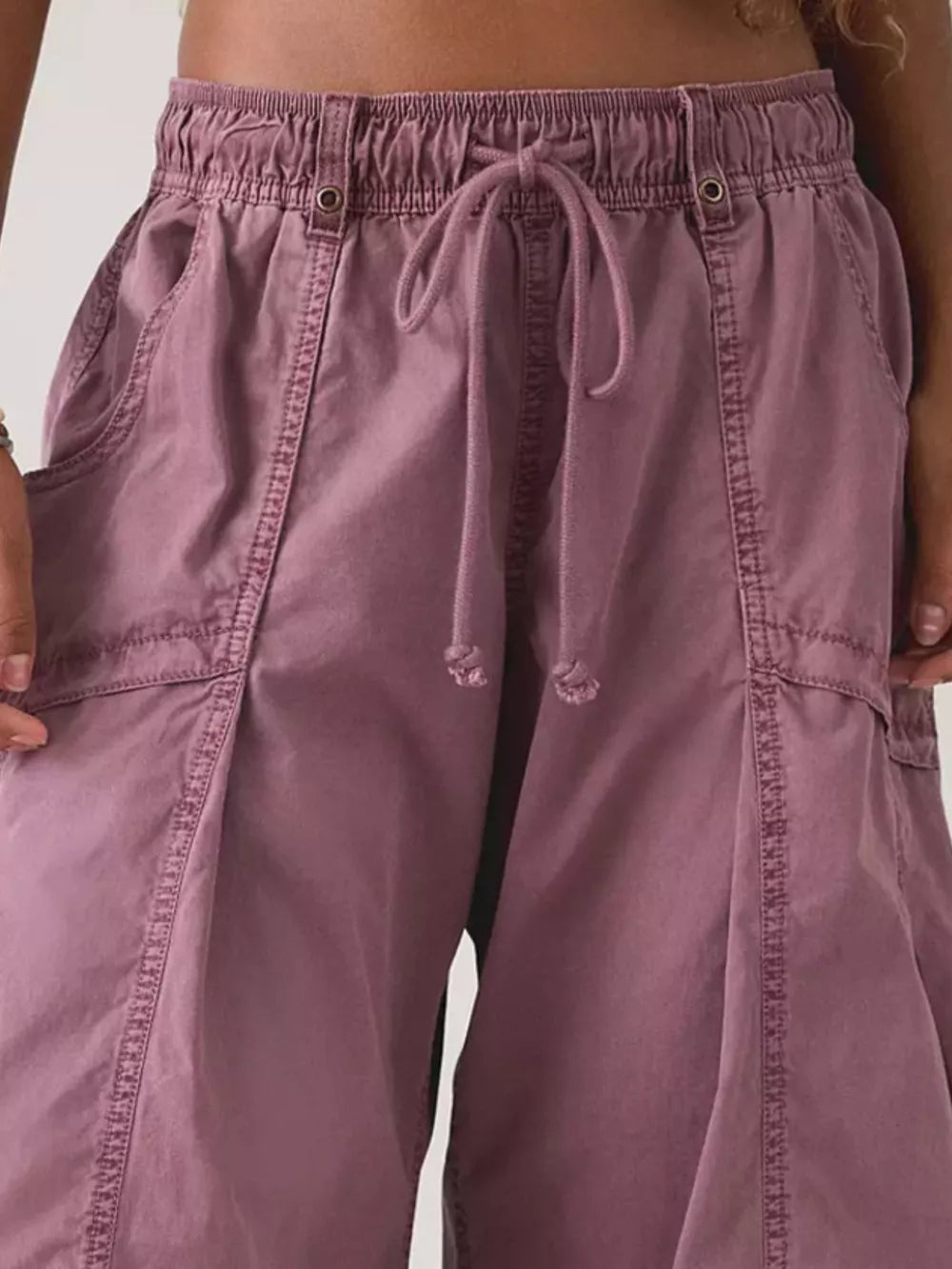 100% polyester Care instructions: Machine wash cold cargo pants in Yellow with wide-leg silhouette