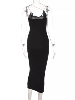 Black midi dress with spaghetti straps and sheer v-neck detail