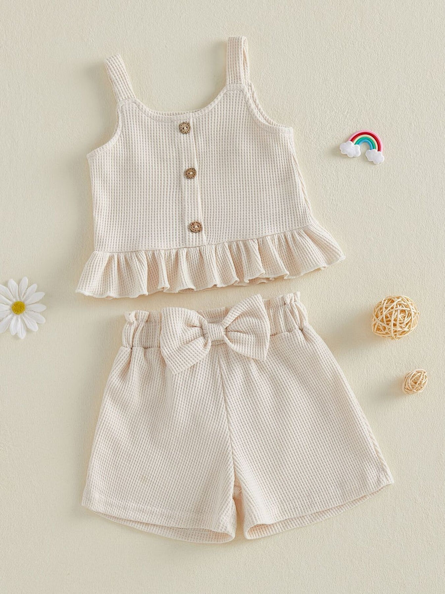 Apricot waffle knit tank top with ruffles and bow shorts set for baby girls.