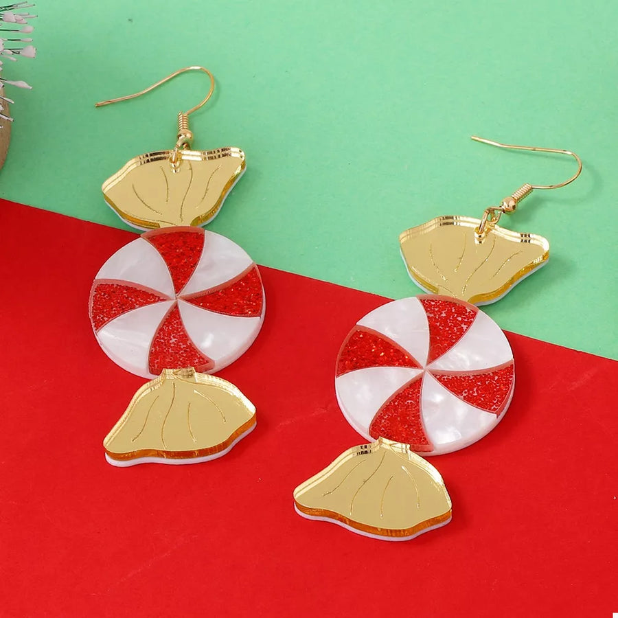 18K Gold-Plated, Acrylic, Zinc alloy Care instructions: 1 earrings in gold with dangle silhouette