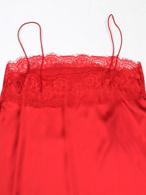 Red satin cami top with lace trim and spaghetti straps.