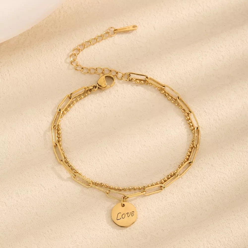 bracelet in gold featuring layered design and regular fit