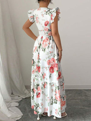 White floral maxi dress with ruffle sleeves and tiered skirt