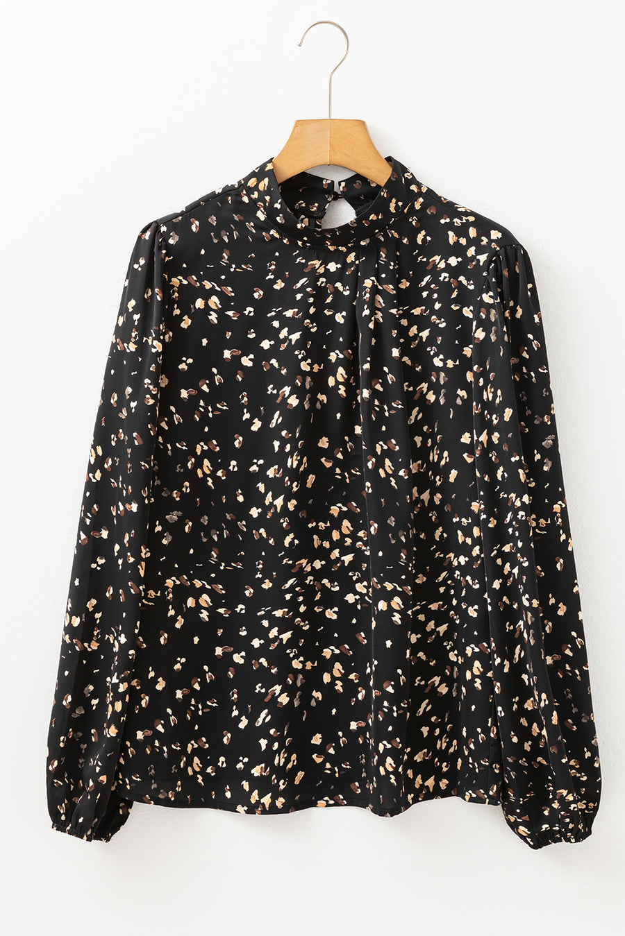 Black abstract print high-neck blouse with keyhole detail and long sleeves