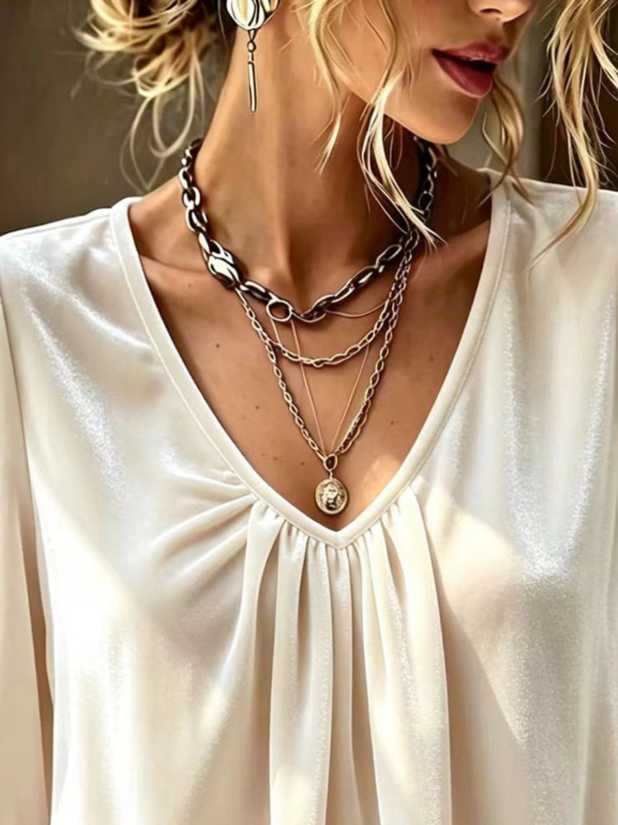 100% polyester Care instructions: Machine wash cold blouse in Beige with relaxed silhouette