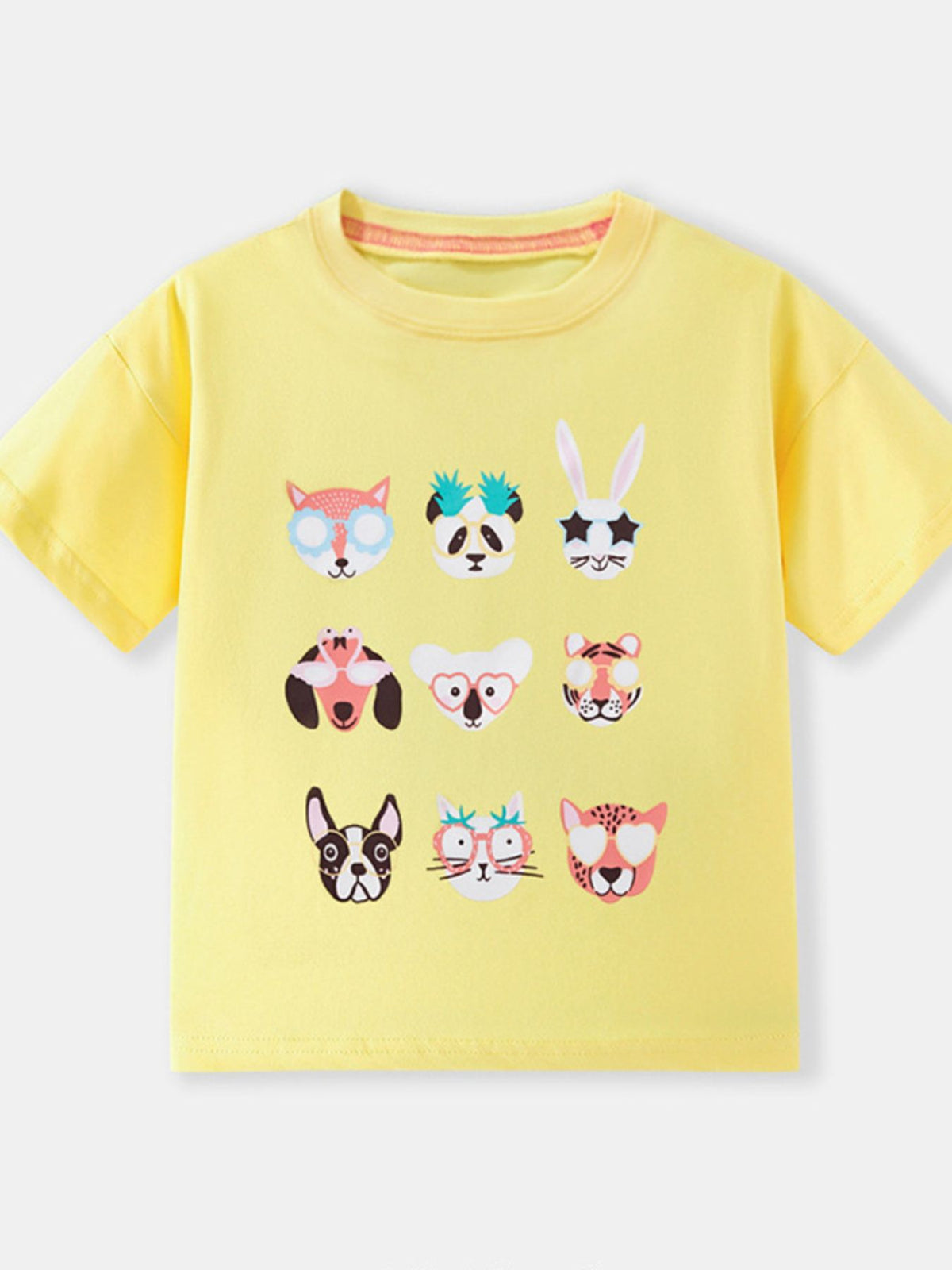 Yellow crew neck t-shirt with a playful animal faces graphic print.