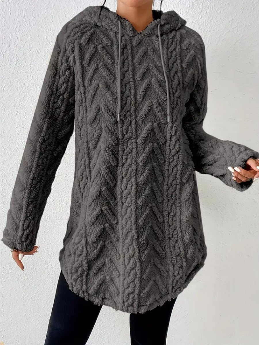 Gray textured fleece hoodie with drawstring and chevron pattern.