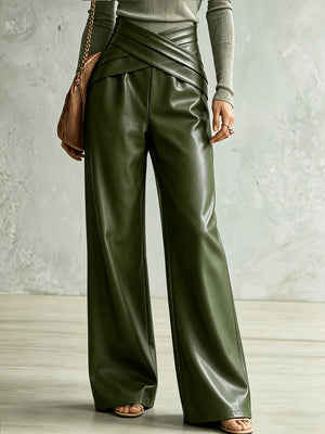 wide-leg pants in olive green featuring seam detail and flared fit