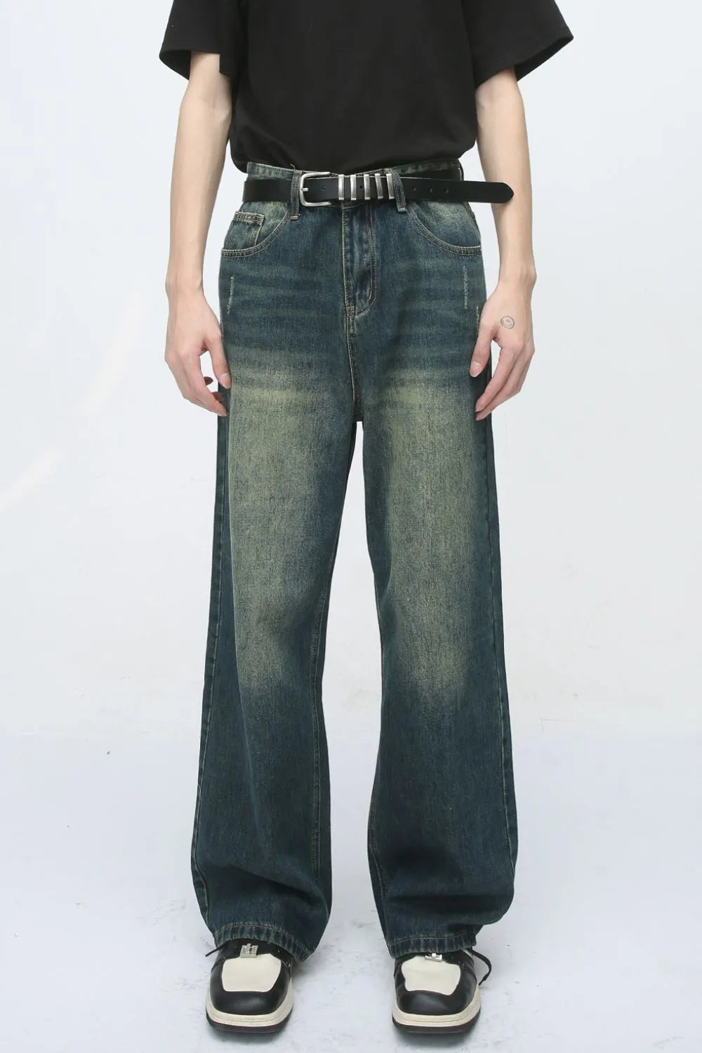 Relaxed fit dark wash denim jeans with pockets and a faded look.