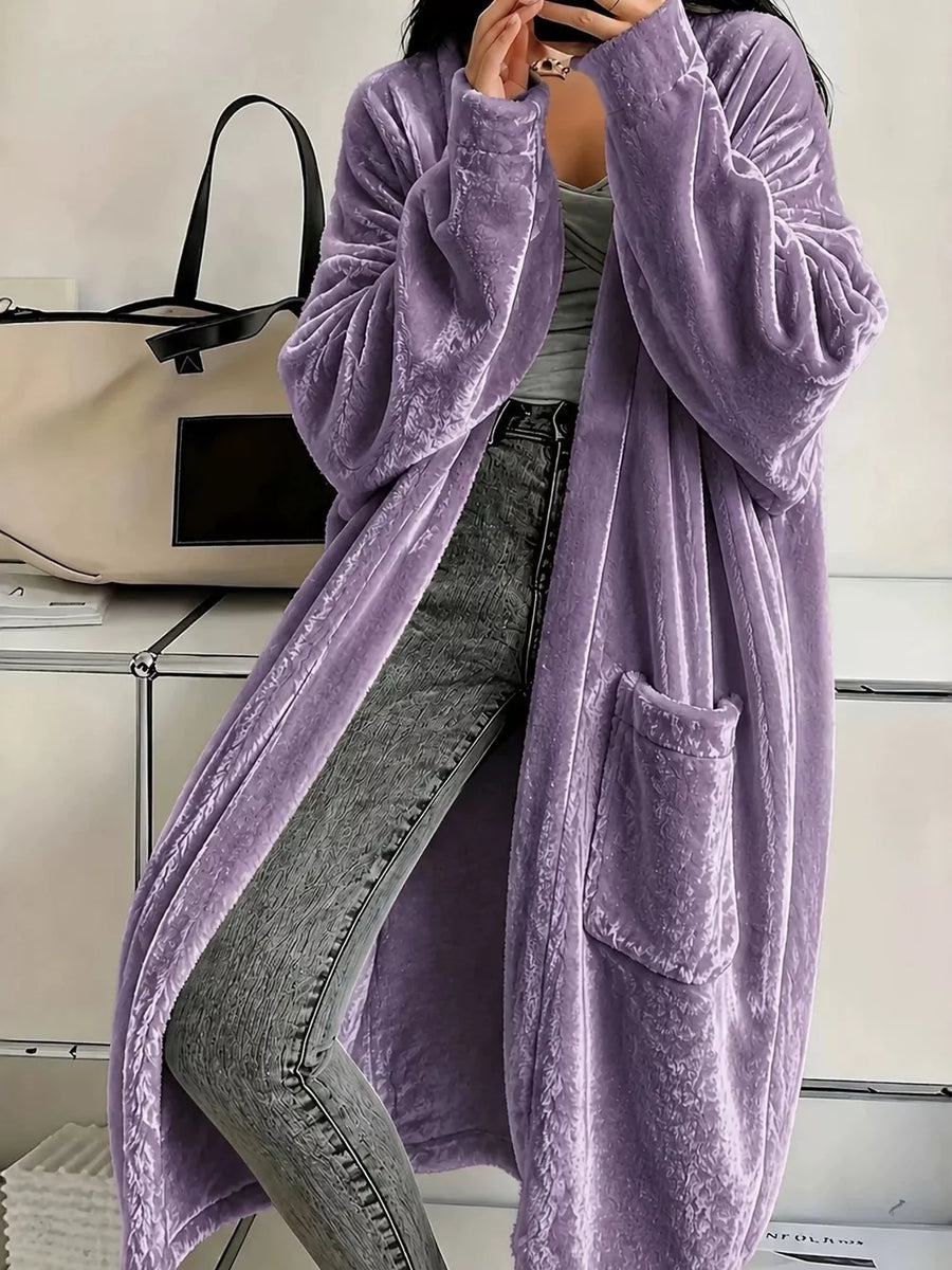 cardigan in lavender featuring pocketed and loose fit