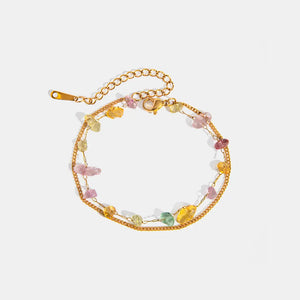Gold double chain bracelet with colorful gemstone chips and lobster clasp