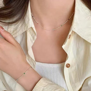 silver necklace with choker length and clasp