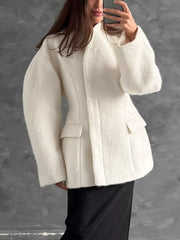 cream coat with seam detail and puff sleeve
